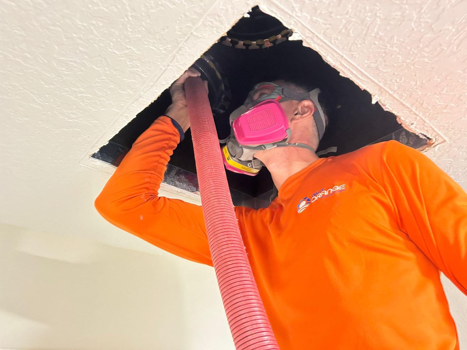 West Orange Air Conditioning technician cleaning residential air ducts in a Horizon West home